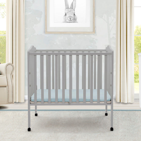 Grey mini outlet crib