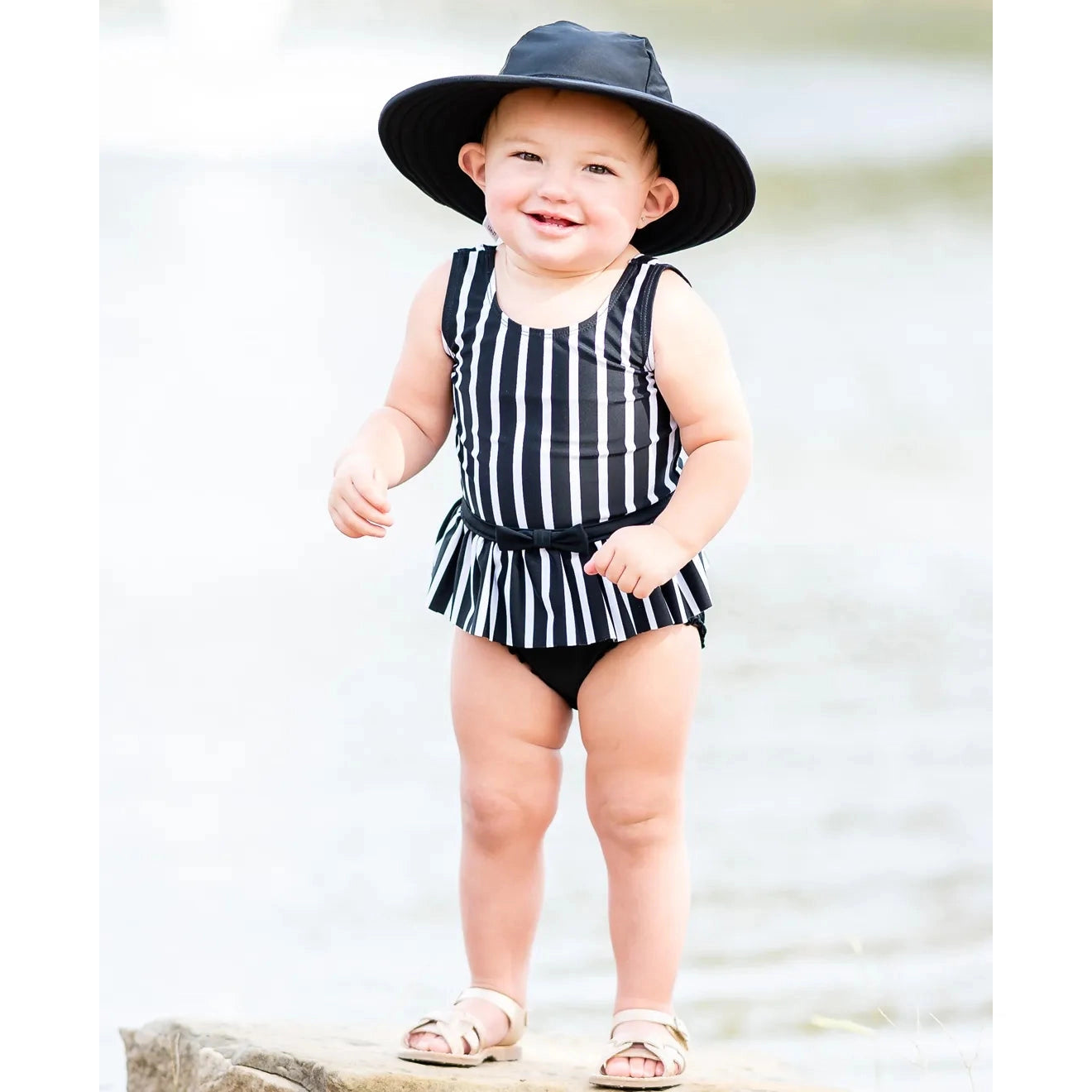 RuffleButts Black & White Stripe Skirted One Piece